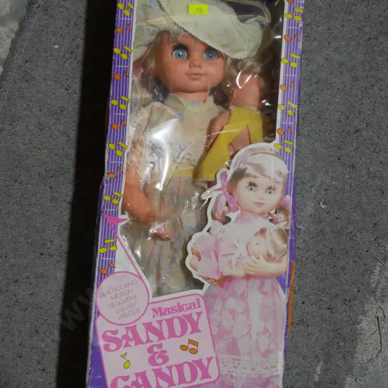 Musical Sandy and Candy dolls
