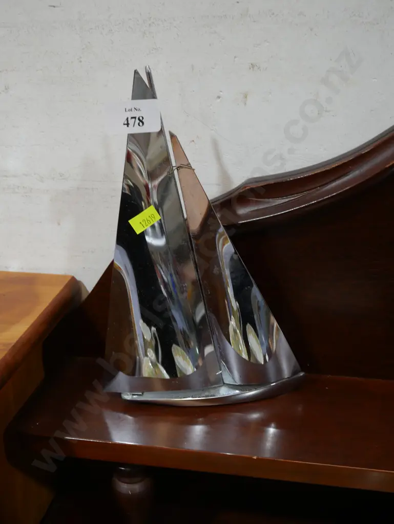 Chrome sailboat sculpture Image 1++