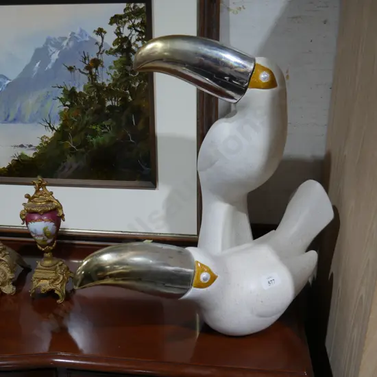 2 bird sculptures