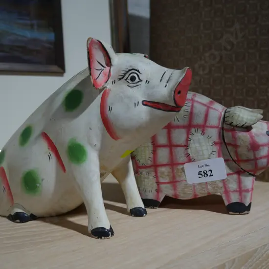 2 wooden painted pig ornaments