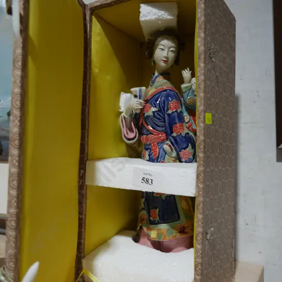 Boxed Oriental figurine