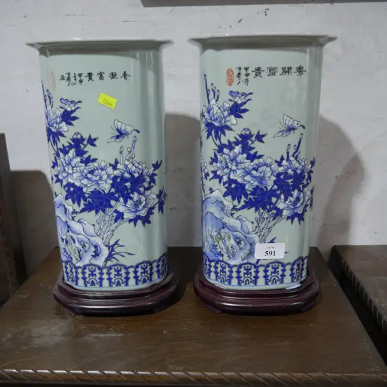 Pair of oriental vases and stands