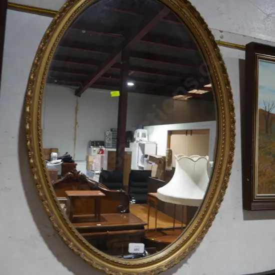 Oval gilt framed mirror