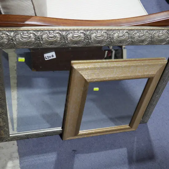 Two modern framed mirrors