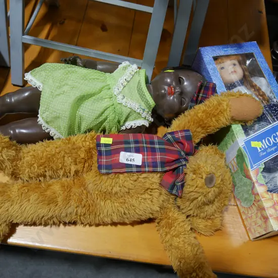 2 dolls and a teddy bear