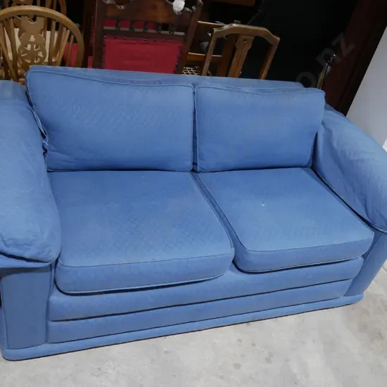 Blue two seater sofa