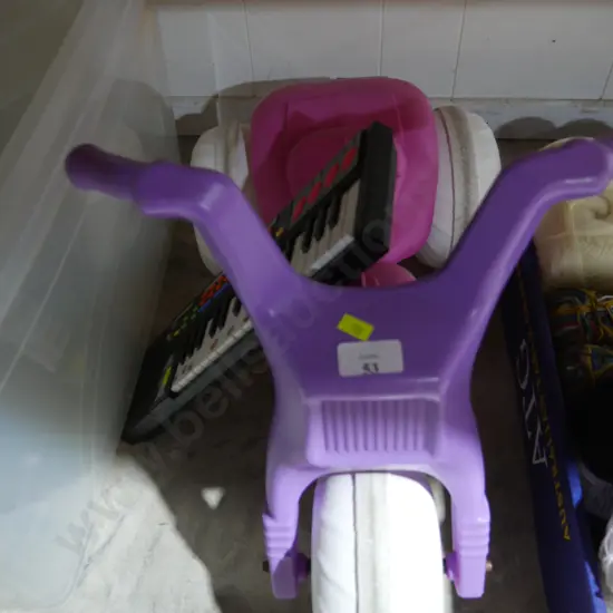 Child's tricycle and electric keyboard
