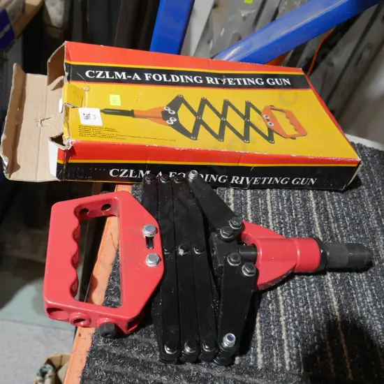 Folding riveting gun