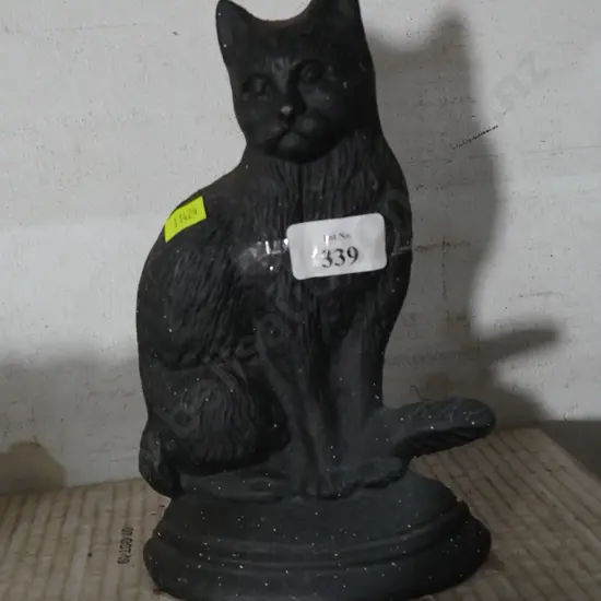 Cast cat door stop