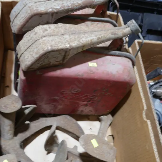 Petrol cans and shoe lasts