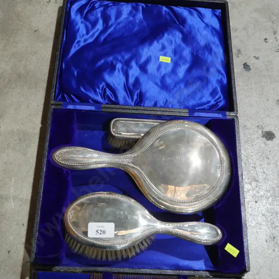 Four-piece sterling silver dressing table set