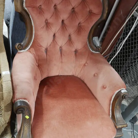 Deep buttoned armchair