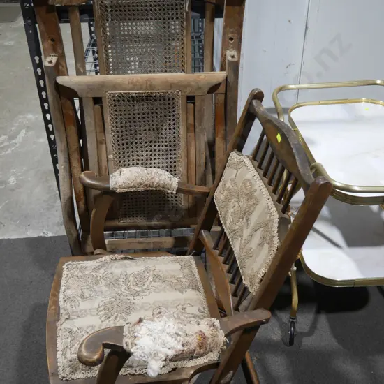 2 folding wooden chairs
