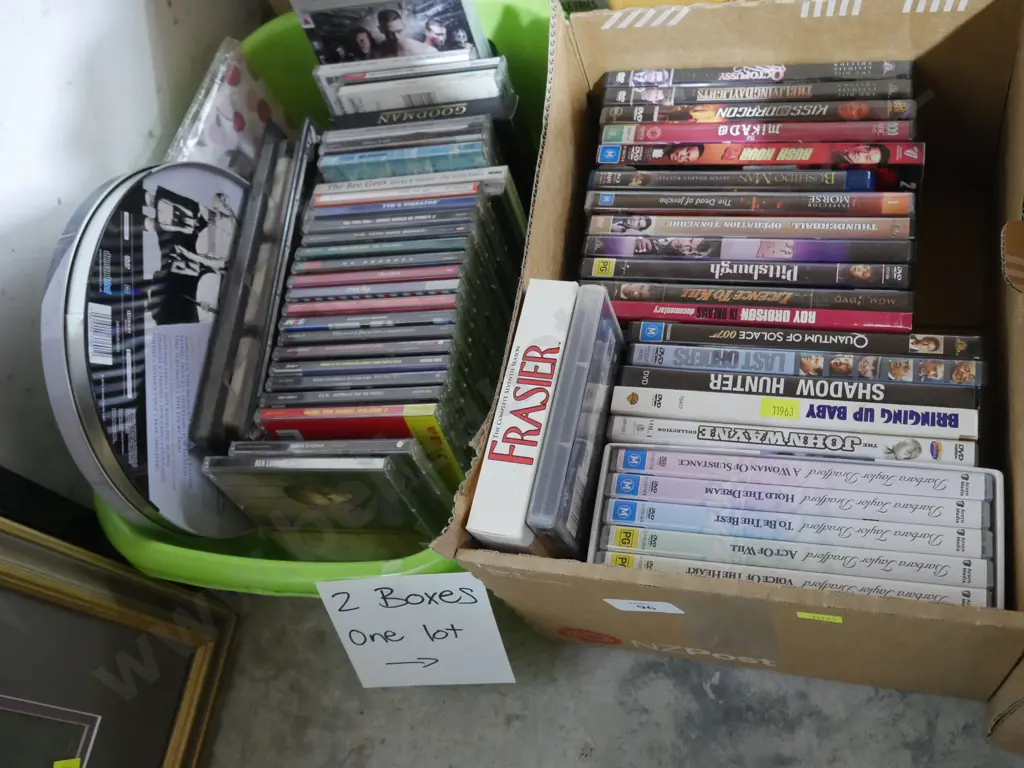 2 boxes of CDs and DVDs Image 1++