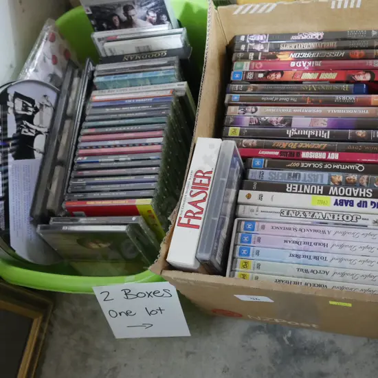 2 boxes of CDs and DVDs