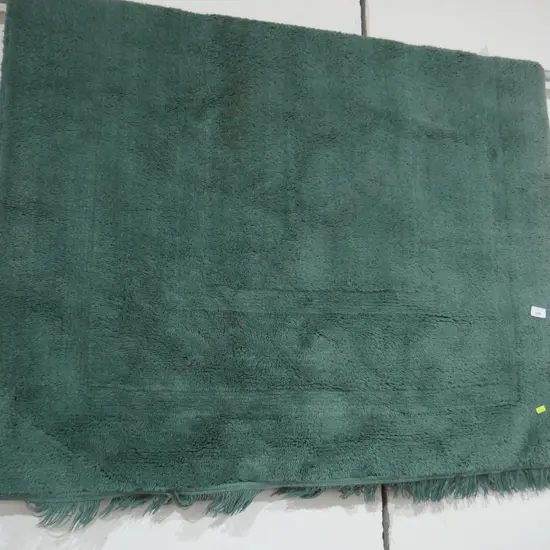 Green floor rug