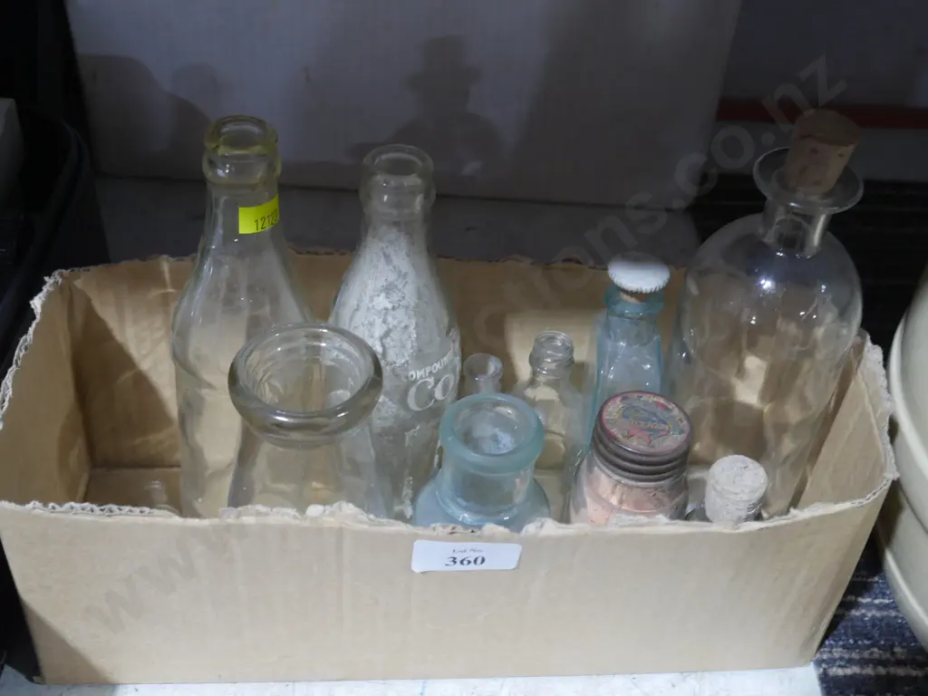 Assorted glass bottles Image 1++