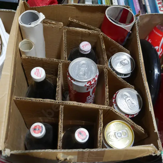 Bottles of Coca-Cola, Coca-Cola cans etc