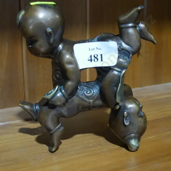 Oriental bronze baby sculpture