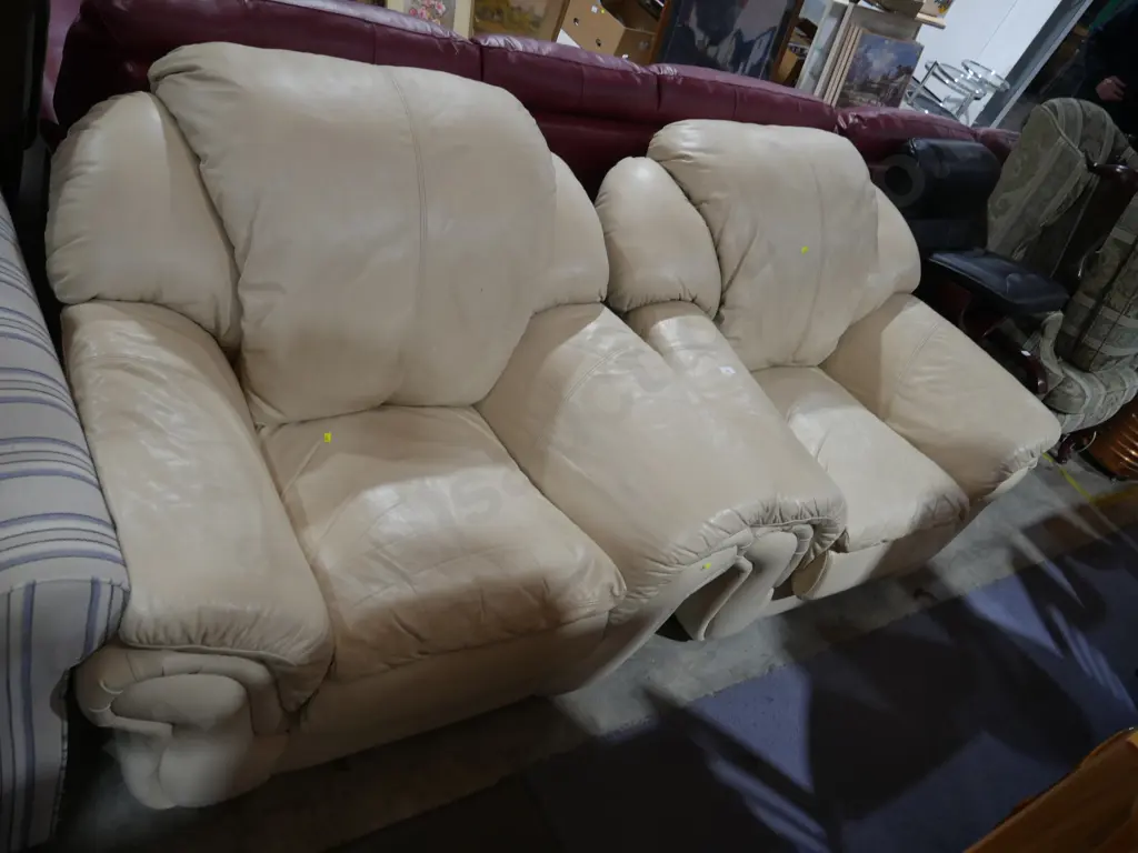 Pair of cream leather armchairs Image 1++