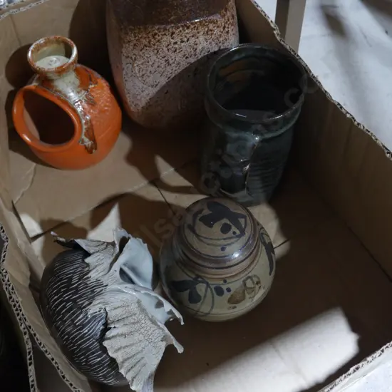 Pottery bowls , vases