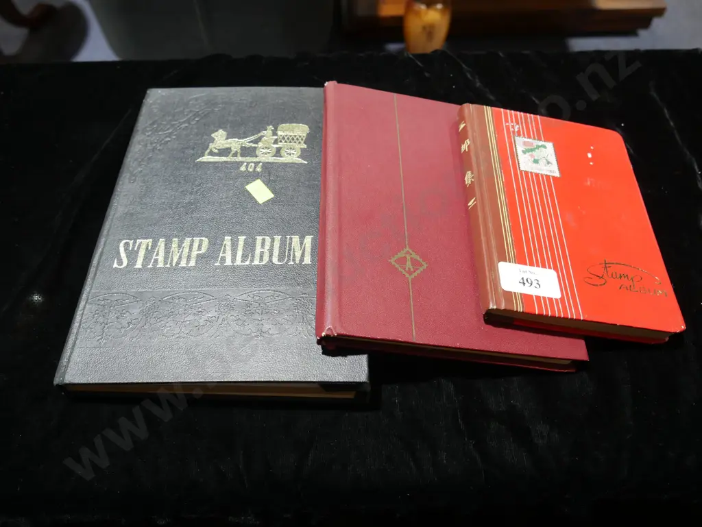 3 stamp albums Image 1++