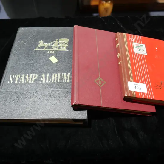 3 stamp albums