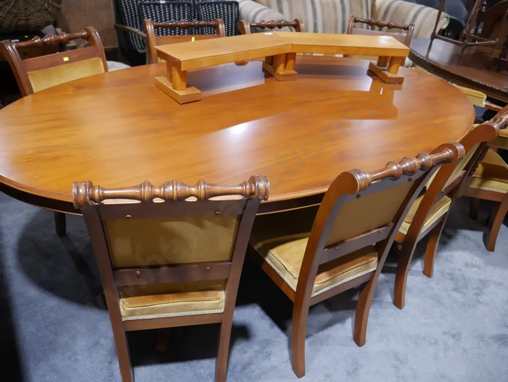 Oval timber table and 8 chairs Image 1++