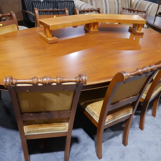 Oval timber table and 8 chairs